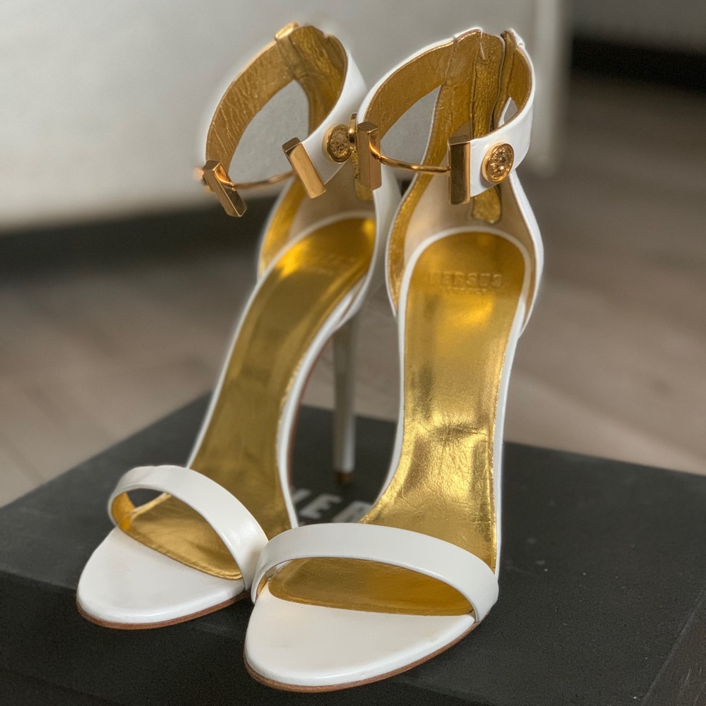 Versace heels with gold accents